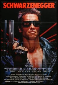 5t875 TERMINATOR int'l 1sh '84 close up of classic cyborg Arnold Schwarzenegger with gun!
