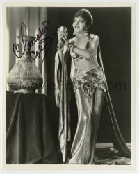 5y750 CLAUDETTE COLBERT signed 8x10 REPRO still '80s in sexy skimpy outfit from Cleopatra!