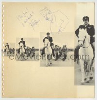 5y074 PETER USTINOV signed 11x11 book page '69 in uniform riding a white horse from Viva Max!