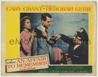 6c434 AFFAIR TO REMEMBER LC #7 '57 Cary Grant & Deborah Kerr take negative from photographer!