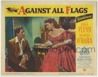 6c437 AGAINST ALL FLAGS LC #3 '52 Maureen O'Hara offers something to seated pirate Errol Flynn!