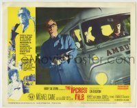 6c662 IPCRESS FILE LC #3 '65 close up of Michael Caine with machine gun by Volkswagen ambulance!