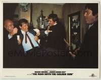 6c726 MAN WITH THE GOLDEN GUN LC R84 Roger Moore as James Bond roughed up by bad guys!