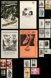 6d074 LOT OF 23 UNCUT PRESSBOOKS '60s-80s advertising images from a variety of different movies!