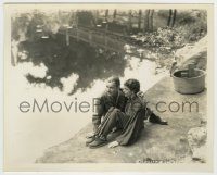 6h523 LOST HORIZON 8x10 still '37 Ronald Colman & Jane Wyatt sitting by water, Frank Capra classic