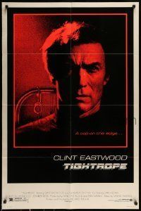 6t899 TIGHTROPE 1sh '84 Clint Eastwood is a cop on the edge, cool handcuff image!