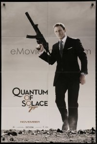 7b650 QUANTUM OF SOLACE teaser DS 1sh 2008 Daniel Craig as Bond with silenced H&K UMP submachine gun