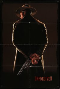 7b931 UNFORGIVEN teaser 1sh 1992 image of gunslinger Clint Eastwood w/back turned, dated design!