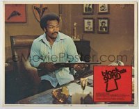 7c103 BLACK GUNN LC #8 1972 great close up of tough Jim Brown behind desk with shotgun!