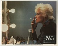 7c122 BODY DOUBLE LC #1 1984 c/u of Melanie Griffith smoking at vanity, directed by Brian De Palma!