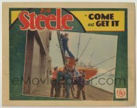 7c190 COME & GET IT LC 1929 sailor Bob Steele tries to escape crowd climbing up ladder!