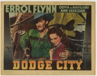 7c235 DODGE CITY LC 1939 great close up of Errol Flynn protecting Olivia De Havilland!