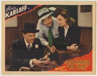 7c238 DOOMED TO DIE LC 1940 Asian detective Boris Karloff examining clue by Withers & Reynolds!