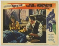 7c264 EVIL OF FRANKENSTEIN LC #3 1964 Katy Wild is puzzled by Peter Cushing working on his monster!