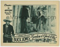 7c335 GORDON OF GHOST CITY chapter 12 LC 1933 Buck Jones tends to wounded outlaw by dead one!
