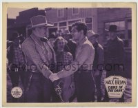 7c358 GUNS IN THE DARK LC 1937 Johnny Mack Brown makes Dick Curtis lower gun during confrontation!