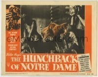 7c397 HUNCHBACK OF NOTRE DAME LC #5 R1952 Charles Laughton as Quasimodo climbing the cathedral!