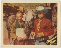 7c581 OUTLAW GOLD LC 1950 close up of cowboy Johnny Mack Brown & old man standing by horse!