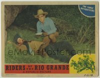 7c690 RIDERS OF THE RIO GRANDE LC 1943 cowboy Bob Steele kneeling over dead guy & reading letter!