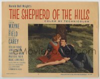 7c766 SHEPHERD OF THE HILLS LC #2 R1955 John Wayne & pretty Betty Field sitting under tree!