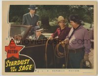 7c830 STARDUST ON THE SAGE LC 1942 man holds gun on Gene Autry & Smiley Burnette with lasso by car!