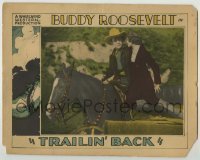 7c904 TRAILIN' BACK LC 1928 Buddy Roosevelt lifts Betty Baker from buckboard to his horse!
