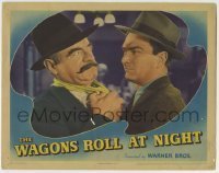 7c941 WAGONS ROLL AT NIGHT LC 1941 close up of Eddie Albert getting tough with Sig Ruman!