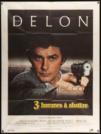 7g970 THREE MEN TO DESTROY French 1p 1980 cool super close image of Alain Delon pointing gun!