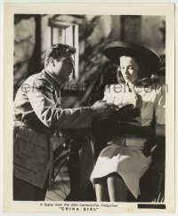 7h295 CHINA GIRL 8.25x10 still 1942 George Montgomery by Gene Tierney clutching package in rickshaw!