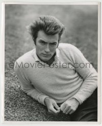7h308 CLINT EASTWOOD 8.25x10 still 1960s close up laying on ground in V-neck sweater!