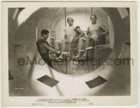 7h916 THINGS TO COME 8x10.25 still R1947 great image of man & woman strapped into spaceship!