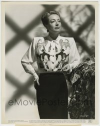7h529 JOAN CRAWFORD 8x10.25 still 1947 great posed portrait in dog print blouse from Possessed!