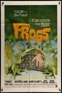 7r328 FROGS 1sh 1972 great horror art of man-eating amphibian with human hand hanging from mouth!