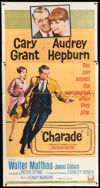 7t671 CHARADE 3sh 1963 art of tough Cary Grant & sexy Audrey Hepburn, expect the unexpected!