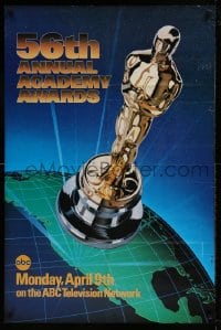 7y009 56TH ANNUAL ACADEMY AWARDS 1sh 1984 great image of the Oscar statuette over the earth!