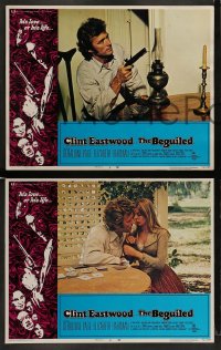 7z656 BEGUILED 5 LCs 1971 c/u of Clint Eastwood sitting at table pointing gun, Don Siegel!