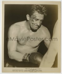 8a165 CHAMPION 8.25x10 still 1949 c/u of wounded boxer Kirk Douglas wearing down, boxing classic!