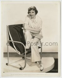 8a186 CLAUDETTE COLBERT 8x10.25 still 1935 in white flannel slacks & mannish shirt w/tennis racket!