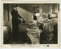 8a209 DAY-TIME WIFE 8x10.25 still 1939 Linda Darnell looks up at Tyrone Power holding her fur!