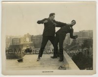 8a295 FEARLESS LOVER 8x10 still 1925 policeman William Fairbanks about to be pushed off roof!