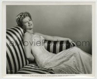8a473 IVY 8.25x10 still 1947 Joan Fontaine lounging on striped couch, bare-shouldered!