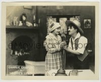 8a237 DOG'S LIFE 8x10 LC 1918 Charlie Chaplin's rake gets tangled with Edna Purviance's pitchfork!
