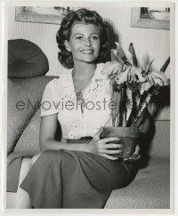 8a756 RITA HAYWORTH 8.25x10 still 1953 happy about the flowers she received, photo by Cronenweth!