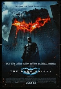 8c221 DARK KNIGHT int'l advance DS 1sh 2008 Christian Bale as Batman in front of flaming building!