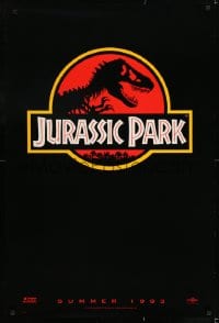 8c495 JURASSIC PARK teaser DS 1sh 1993 Steven Spielberg, classic logo with T-Rex over red background