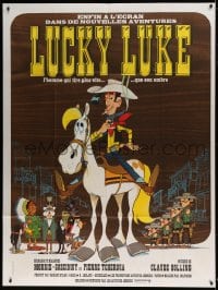 8f761 LUCKY LUKE French 1p 1971 great cartoon art of the smoking cowboy hero on his horse!
