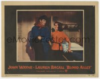 8k434 BLOOD ALLEY LC #5 1955 John Wayne stares at sexy Lauren Bacall in bedroom, William Wellman