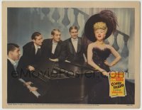 8k477 CONEY ISLAND LC 1943 sexy Betty Grable in feathered dress sings to four men at piano!