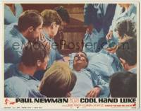 8k483 COOL HAND LUKE LC #5 1967 beaten Paul Newman on his bunk with all the men gathered around!