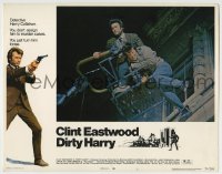 8k522 DIRTY HARRY LC #1 1971 c/u of Clint Eastwood with guy on lift, Don Siegel crime classic!